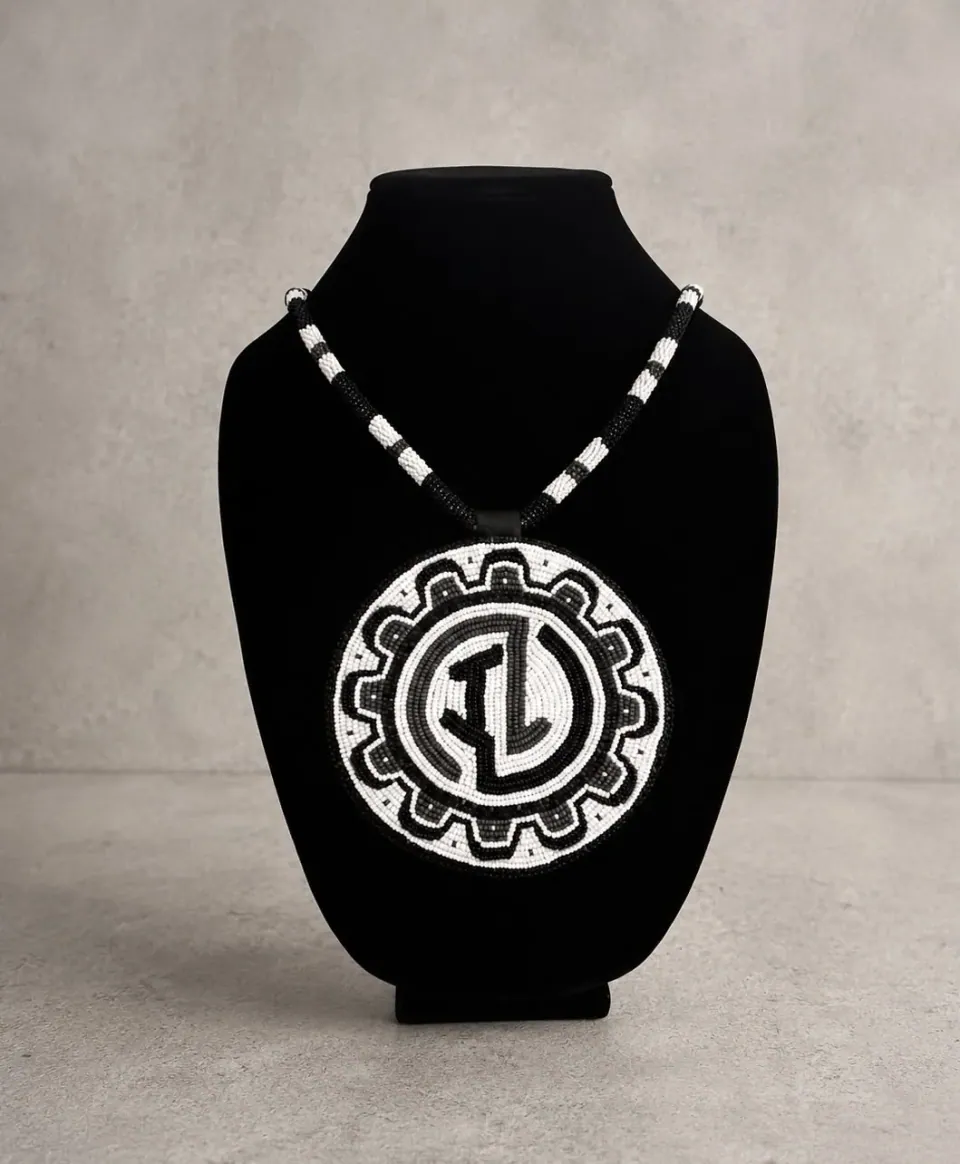 Custom black and white Indigenous Lifestyle beaded medallion necklace